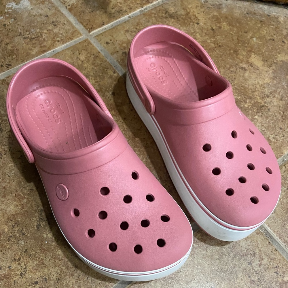 Pink platform crocs, like new.